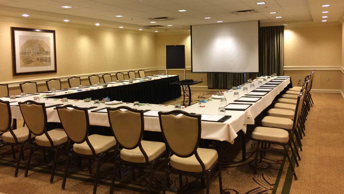 Meeting room with horseshoe set up