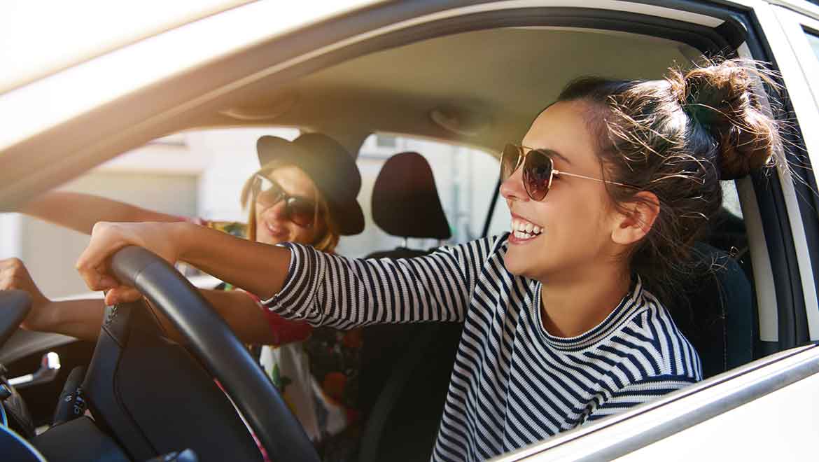 Woman driving a car.