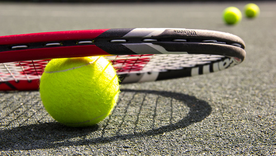 Tennis ball and racquet