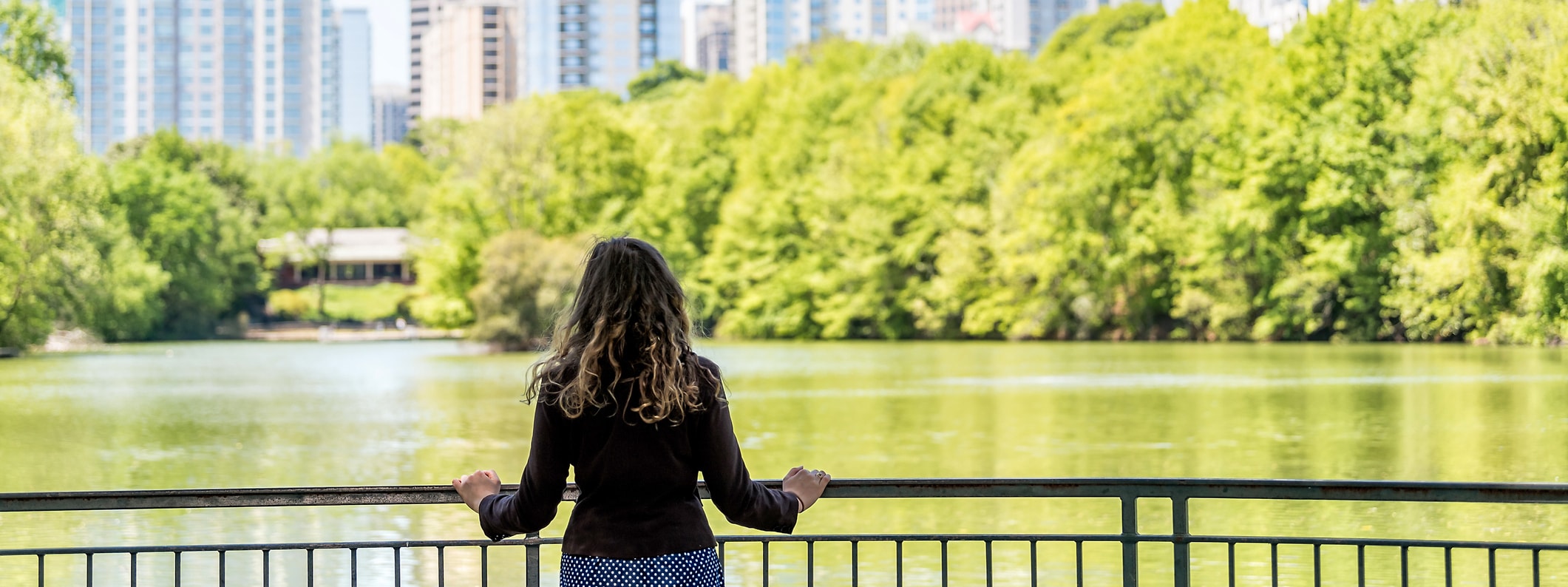 Woman looking at river