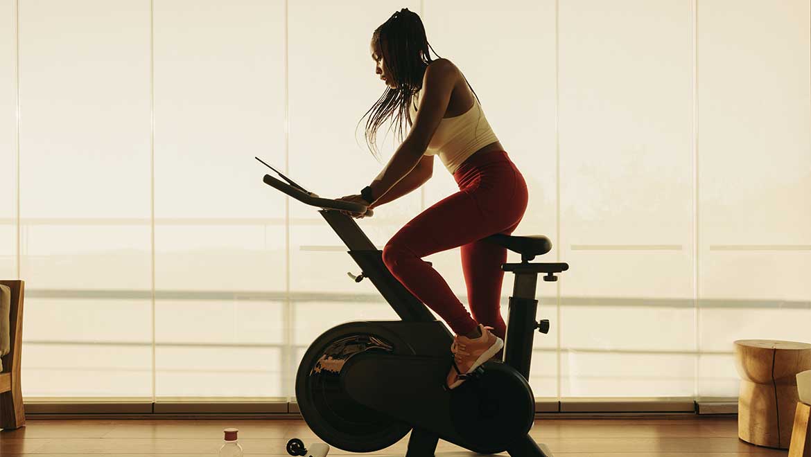 Woman on a cycling machine