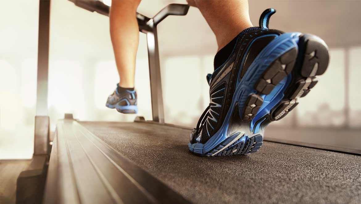 Person running on treadmill.
