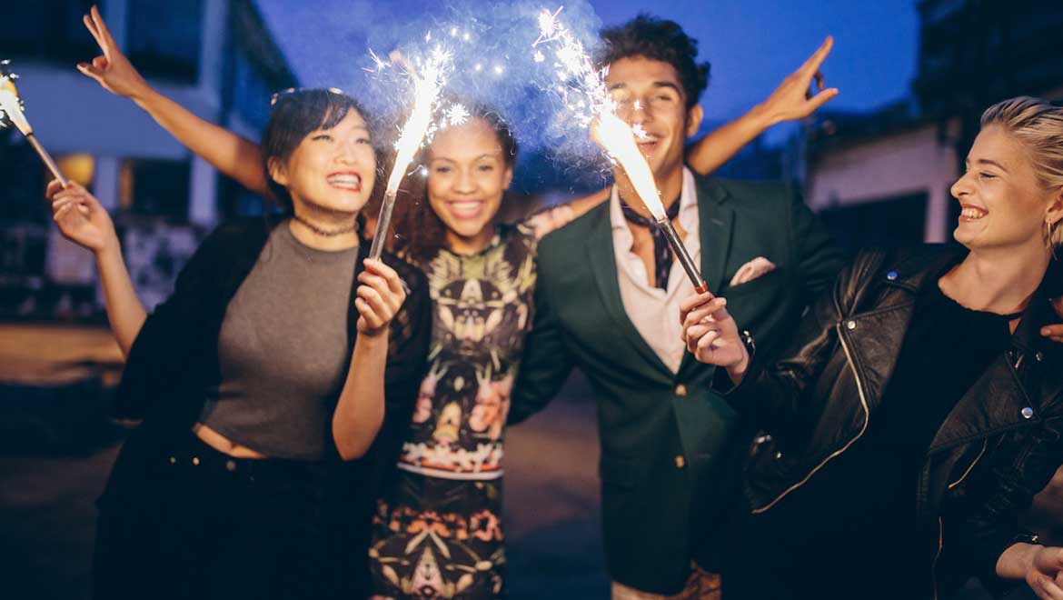 Young adults with sparklers
