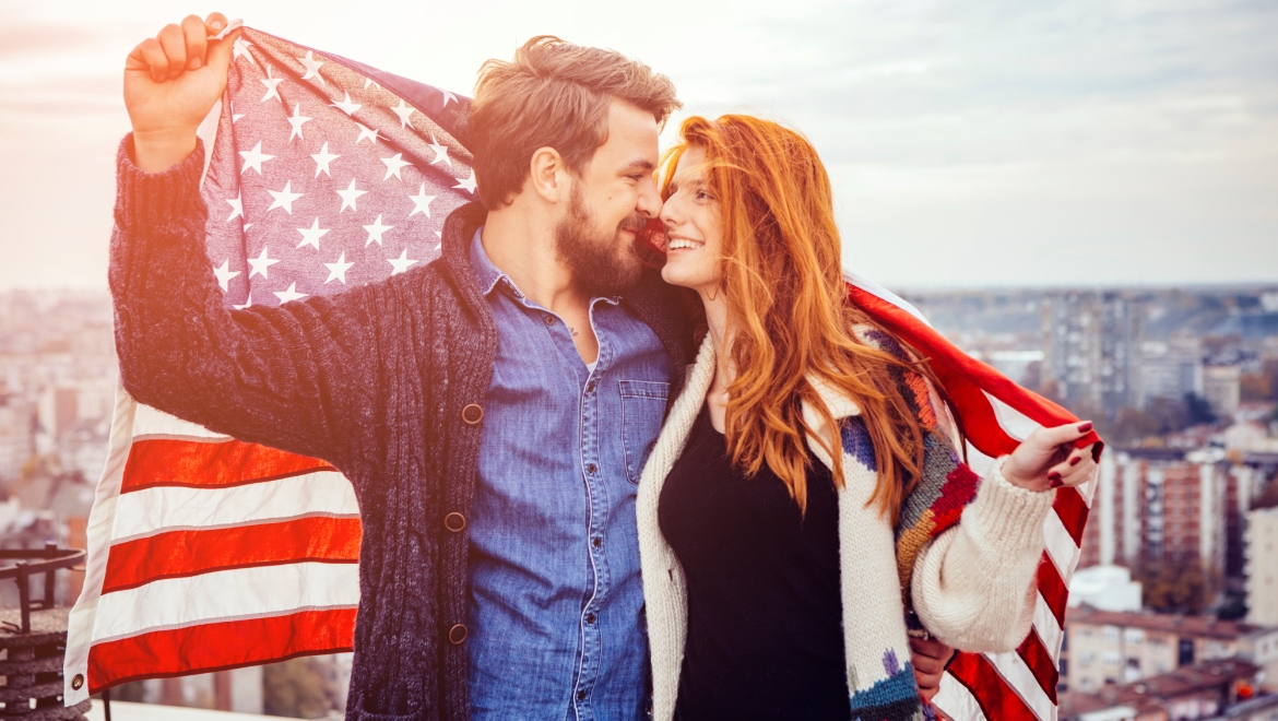 Young Couple American Flag
