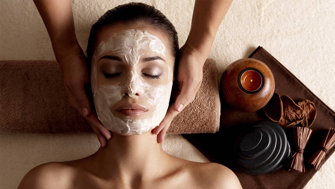 Woman receiving a facial