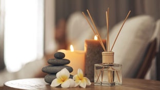 Candles, flowers and scent diffuser