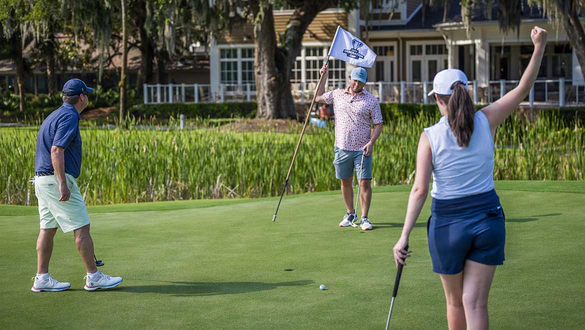 Family golfing