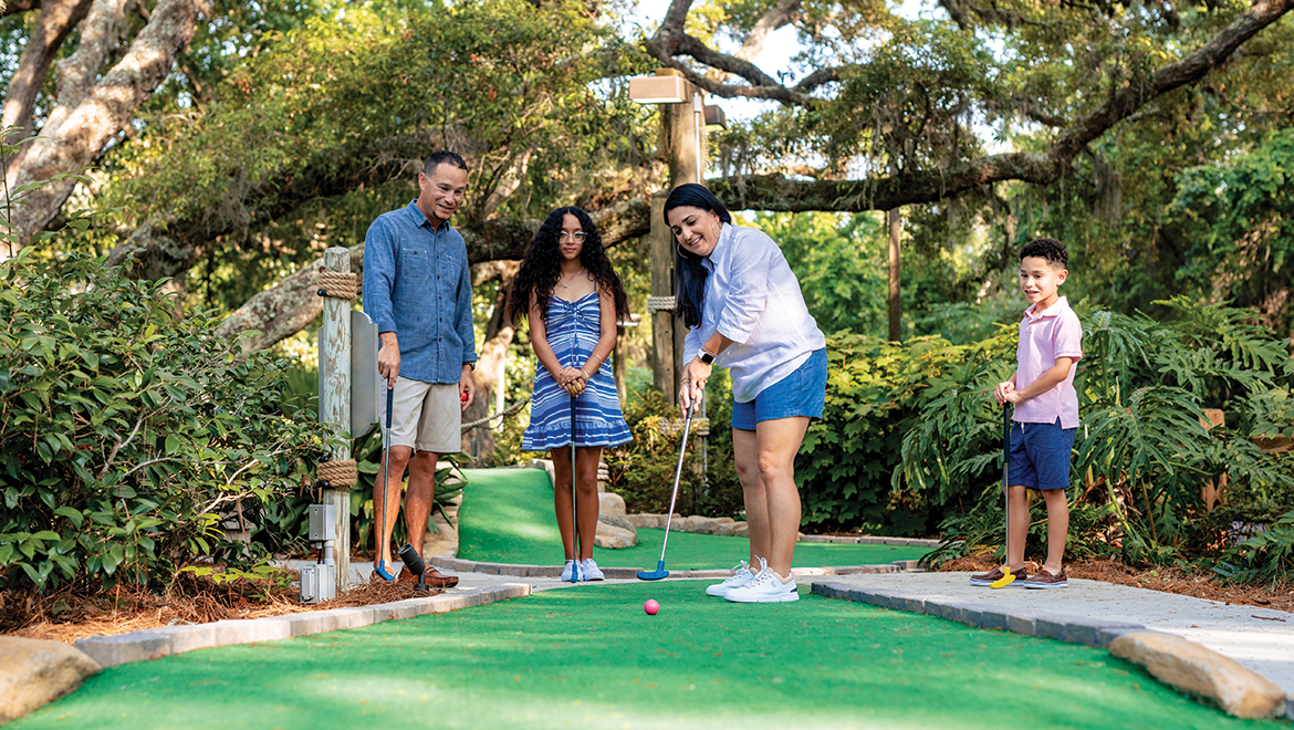 Family Playing at Heron's Cove Adventure Golf