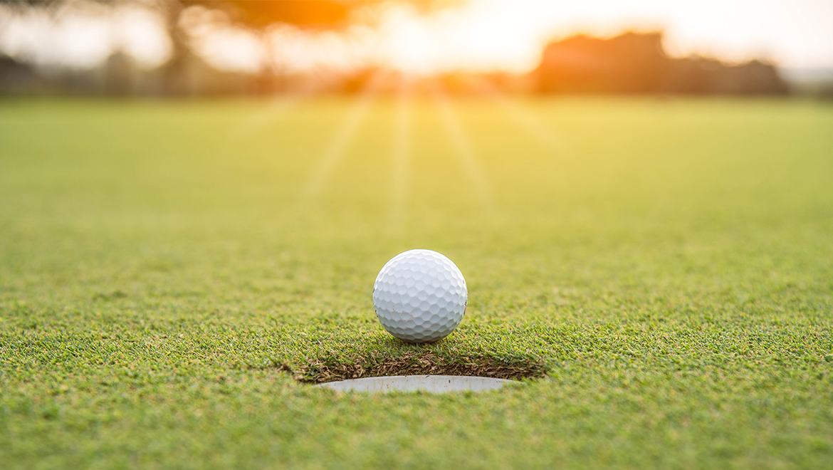 Golf ball at sunset