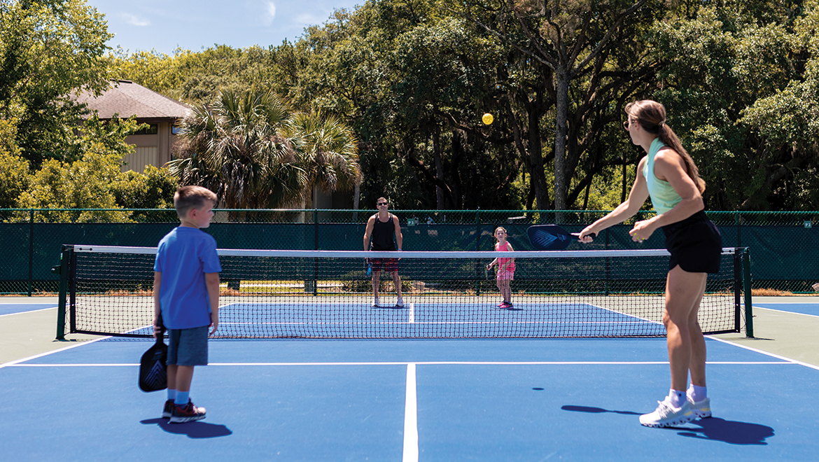 Family Playing Pickleball