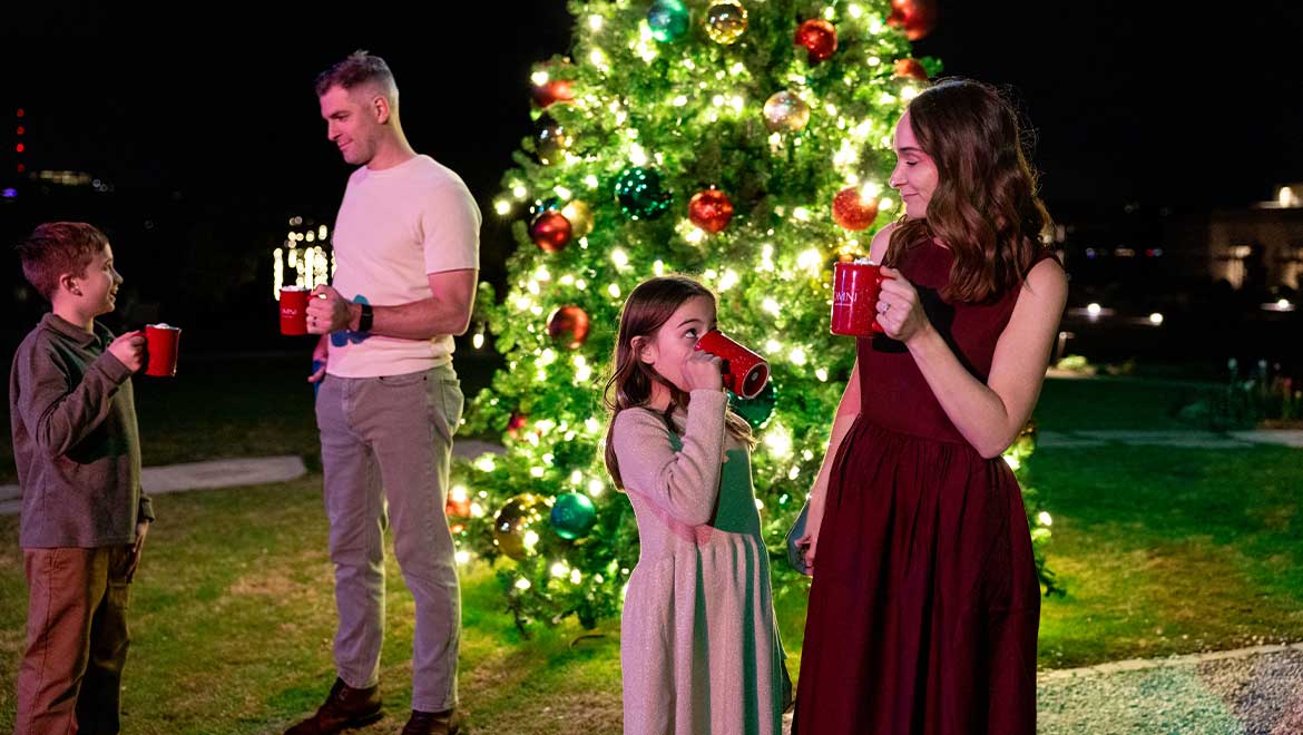 family drinking hot chocolate