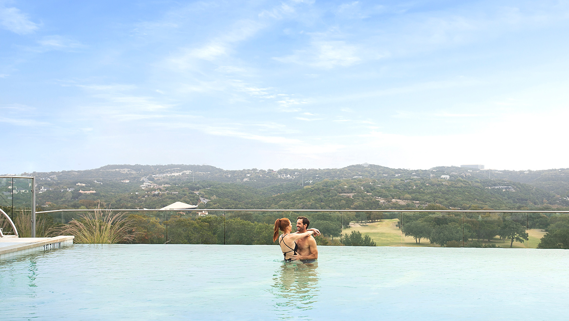 Couple in the infinity pool.