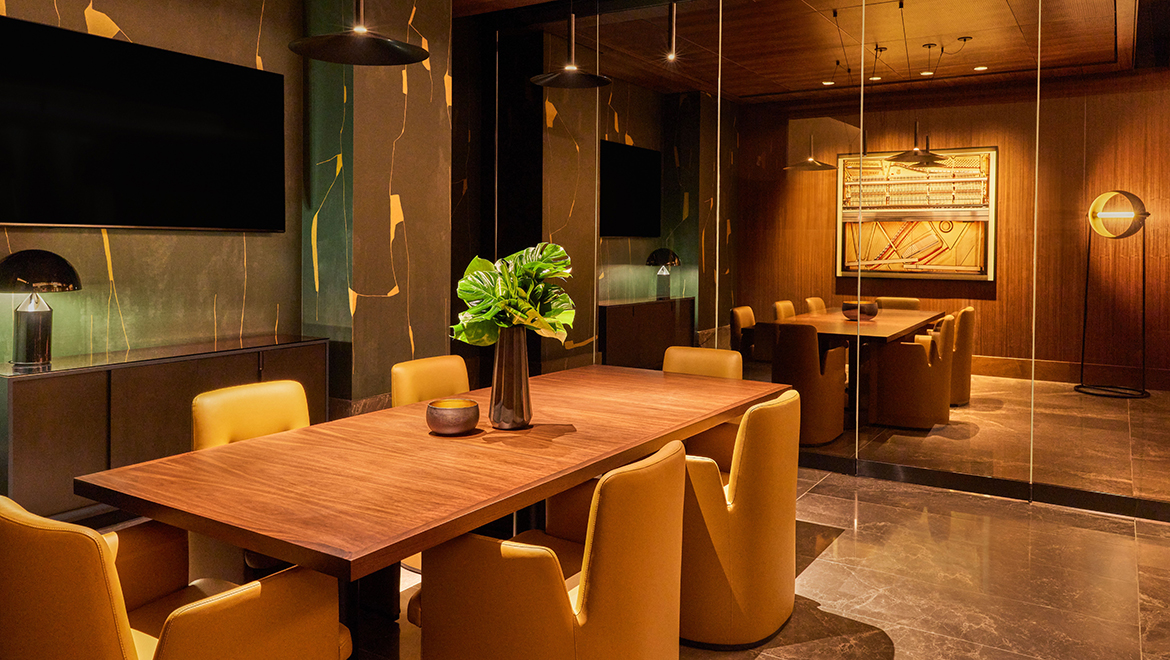 The two private dining rooms in Kestra double as coworking spaces, with a retractable glass wall to create one large space for networking or events - Omni Boston Hotel at the Seaport