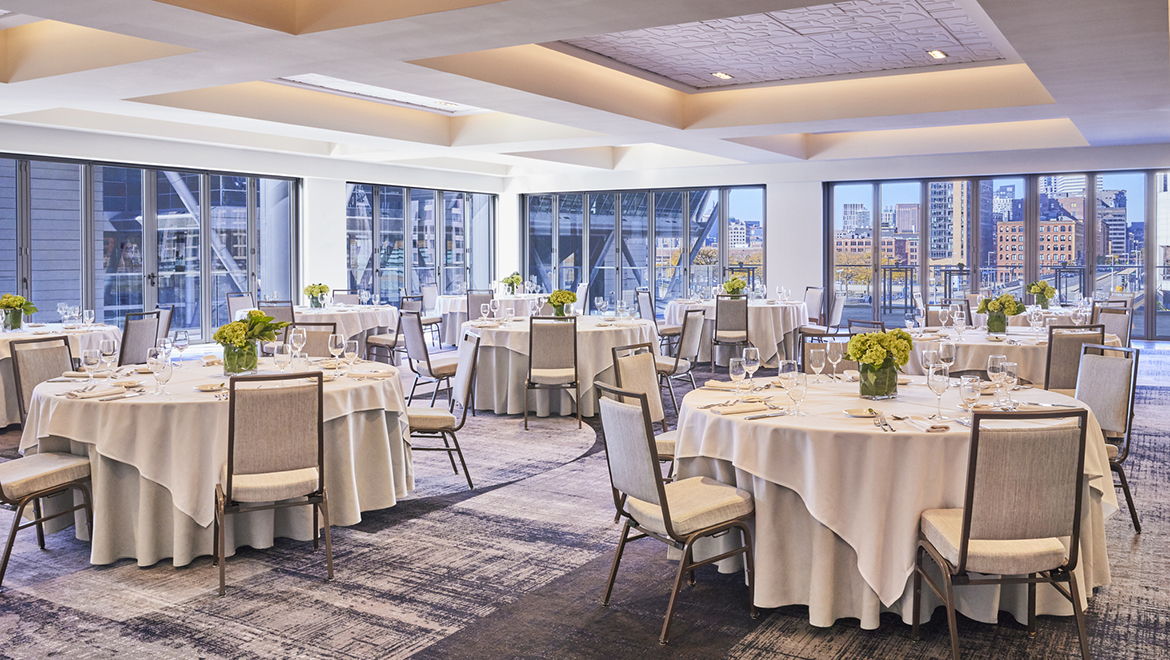 The Contemporary meeting room offers the option of indoor/outdoor functions and access to Elevate outdoor terrace - Omni Boston Hotel at the Seaport