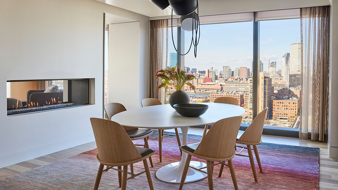 The Director and Choreographer Suites offer a sophisticated color palette of natural neutrals highlighted with rich burgundy - Omni Boston Hotel at the Seaport