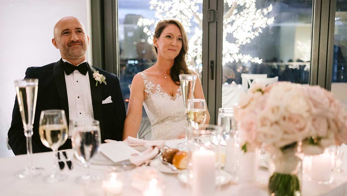 Bride and Groom at a dining table