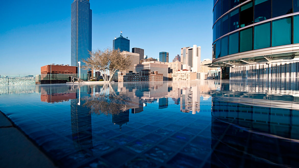 Dallas skyline reflected in pool