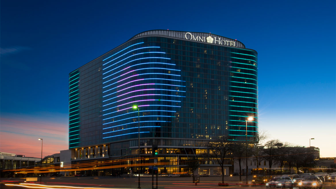 Omni Dallas Hotel exterior at dusk