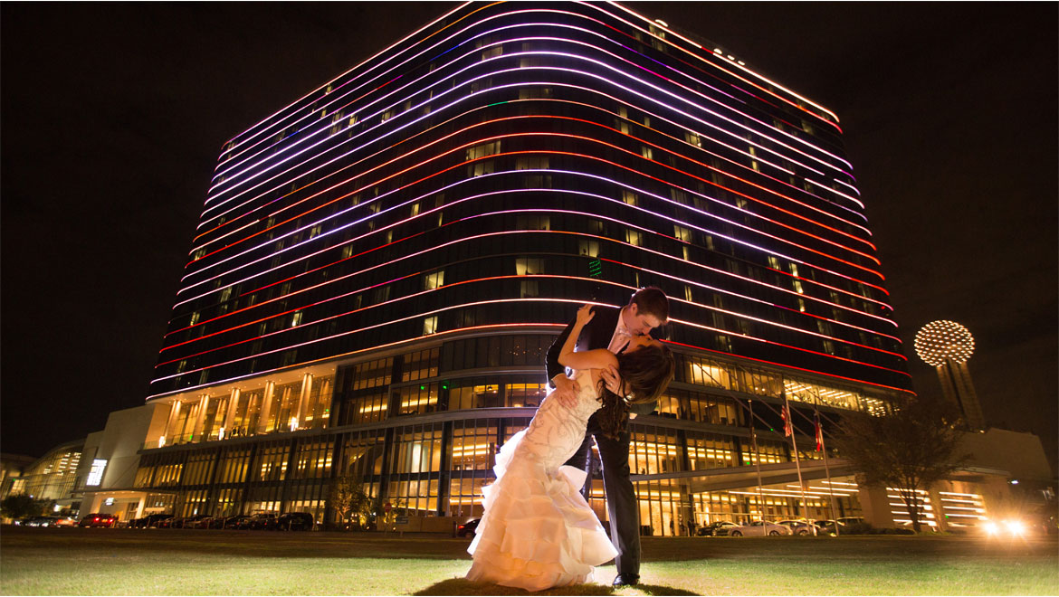 Bride and groom outside Omni Dallas Hotel