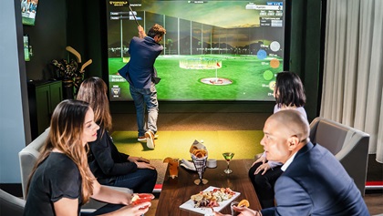 Group playing virtual golf