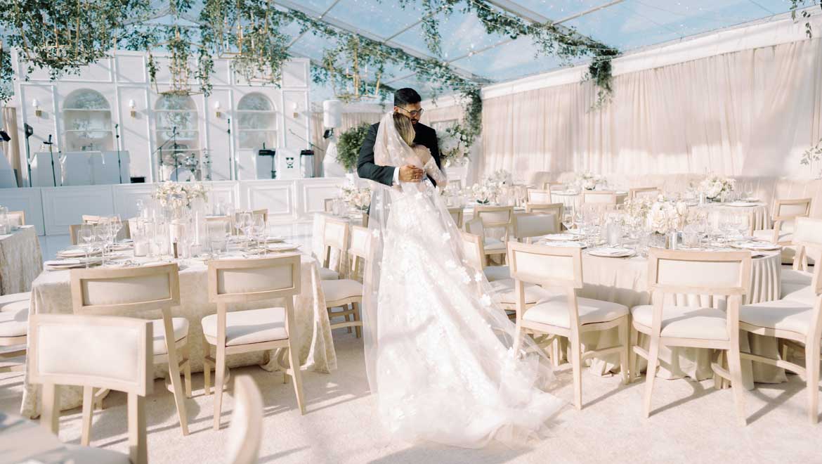 Bride and Groom in wedding reception tent.