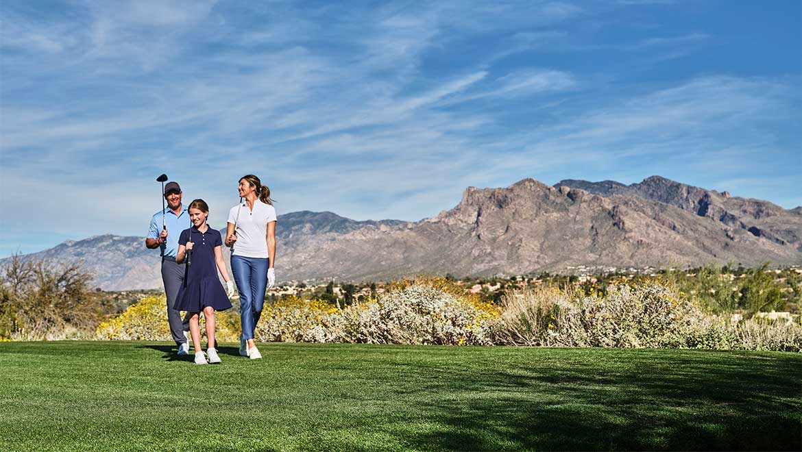 family golfing