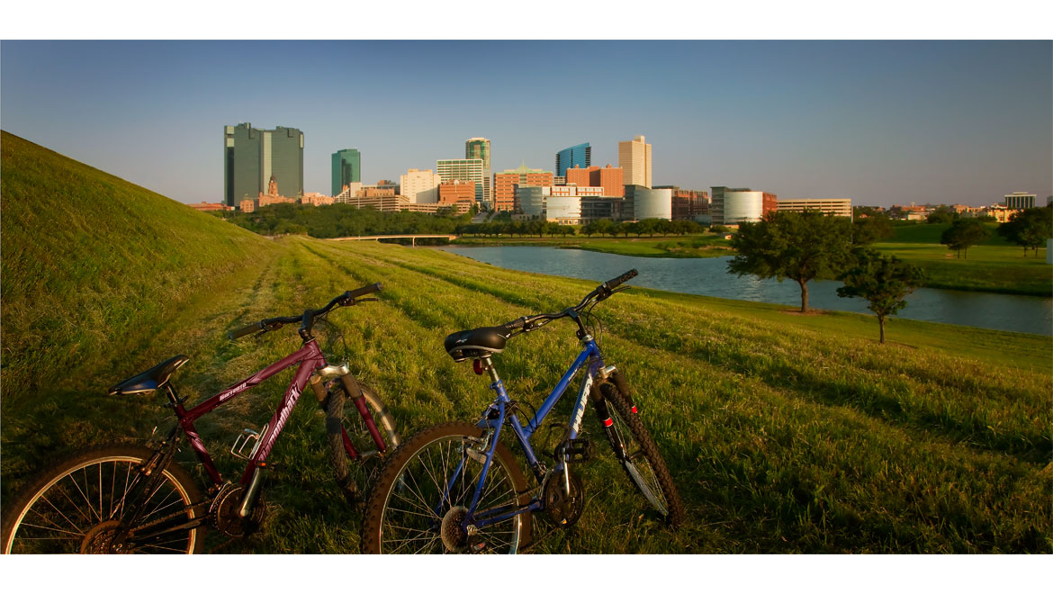 Bikes in front of Fort Worth skyline 