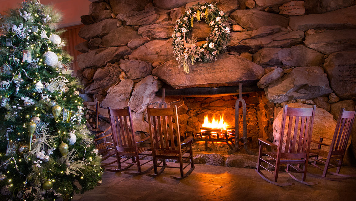 great hall fireplace with christmas tree