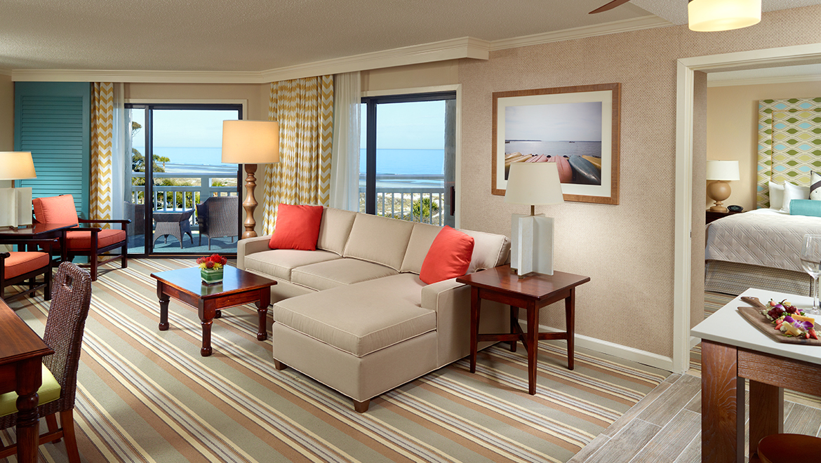 Newly renovated oceanfront luxury suite with king bed and parlor with sofa