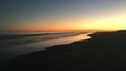 orange sunset on the beach outside the Omni Resort