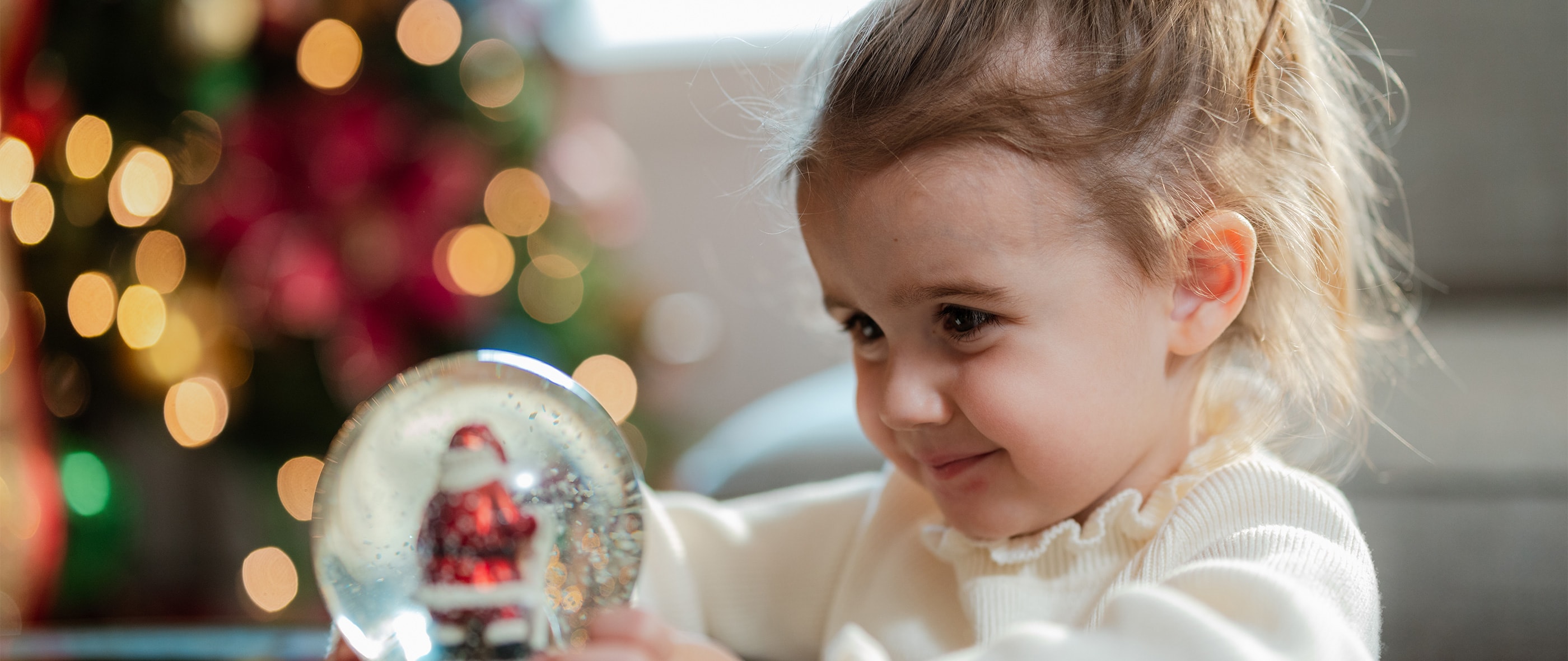 little girl snow globe
