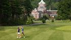 Couple golfing on golf course