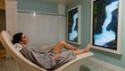 Woman relaxing on lounge chair.