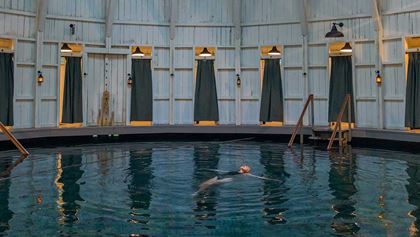 Woman floating in a pool