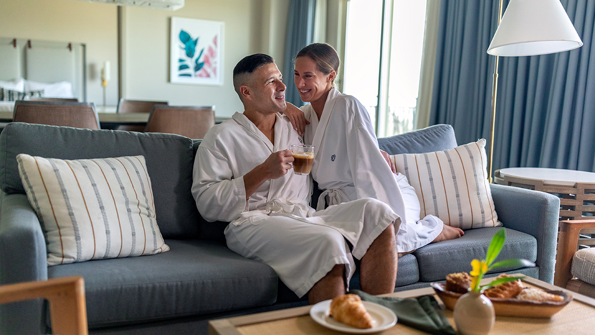 Couple enjoying room service at Omni Orlando Resort
