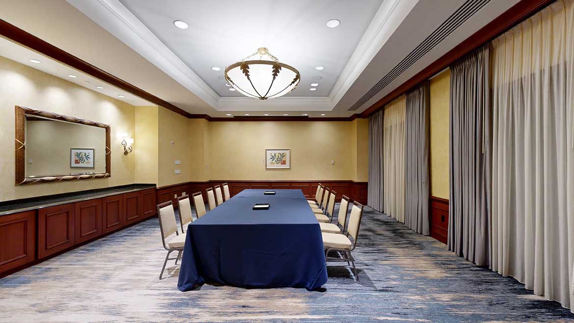 Meeting room with long table.