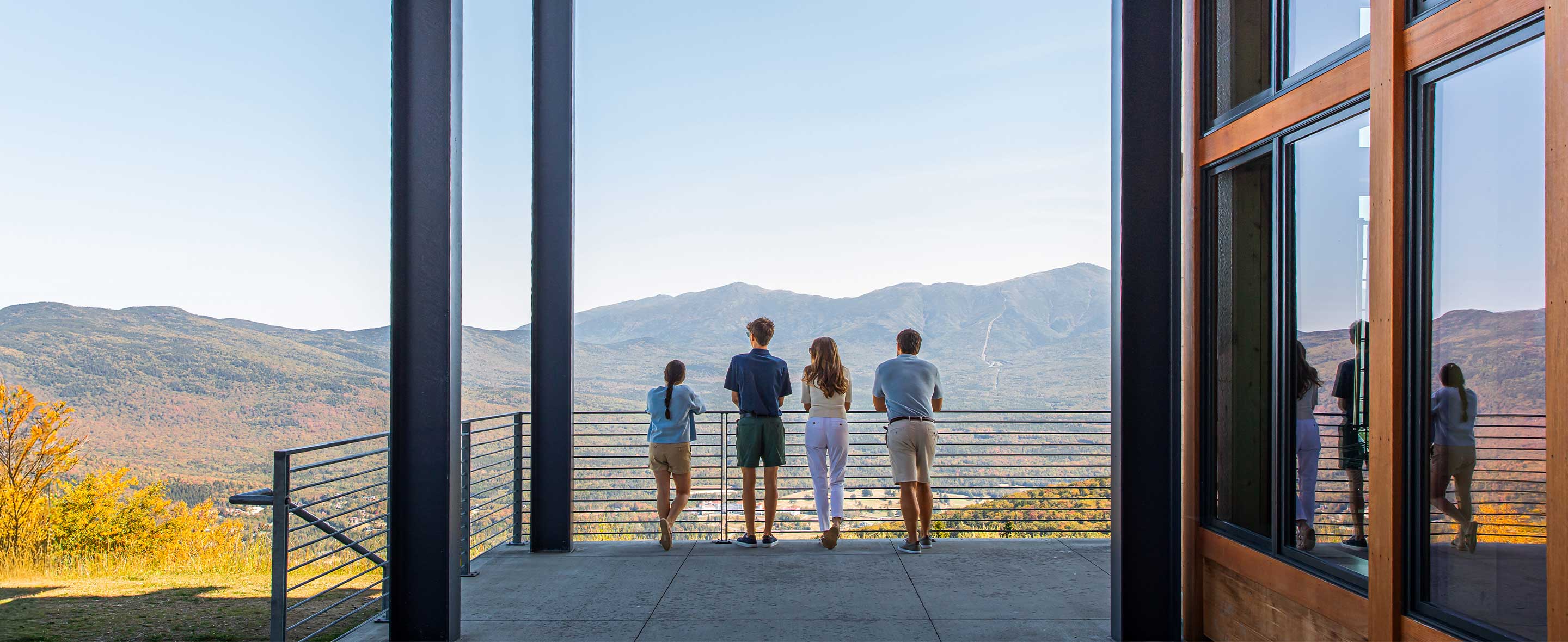 family looking at the mountain view