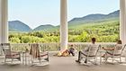 family sitting on porch