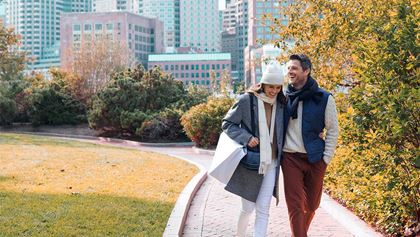 Couple walking through the park