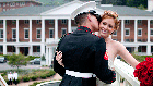 Bride and groom on bridge