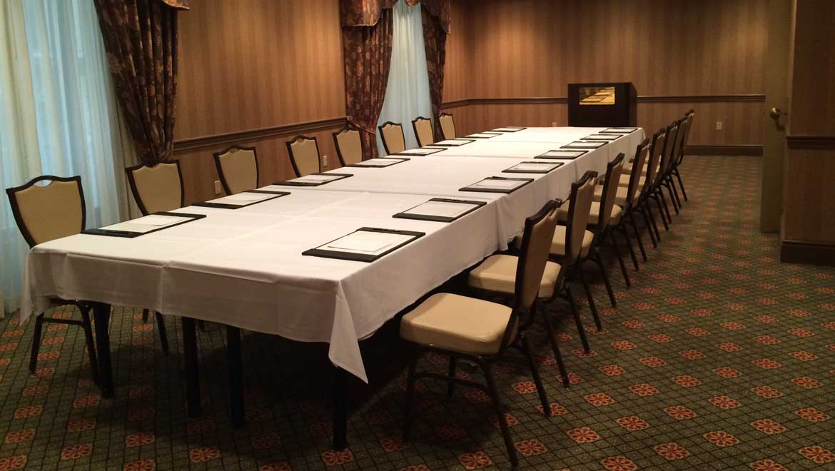 Conference room with single long table.