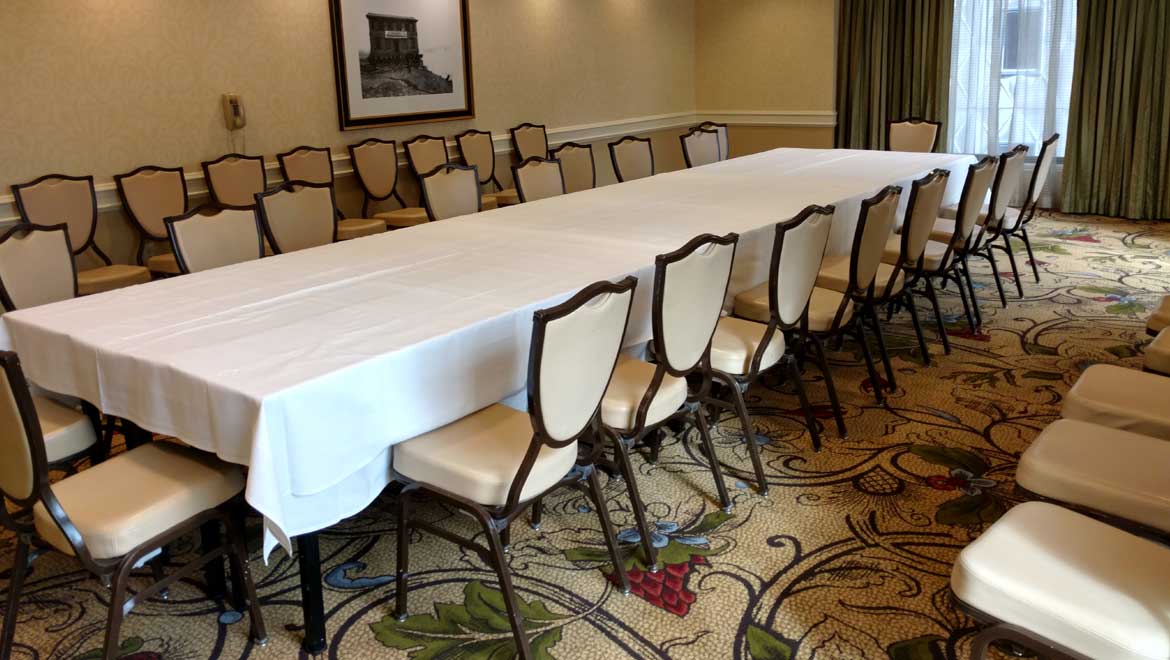 Meeting room with long table.