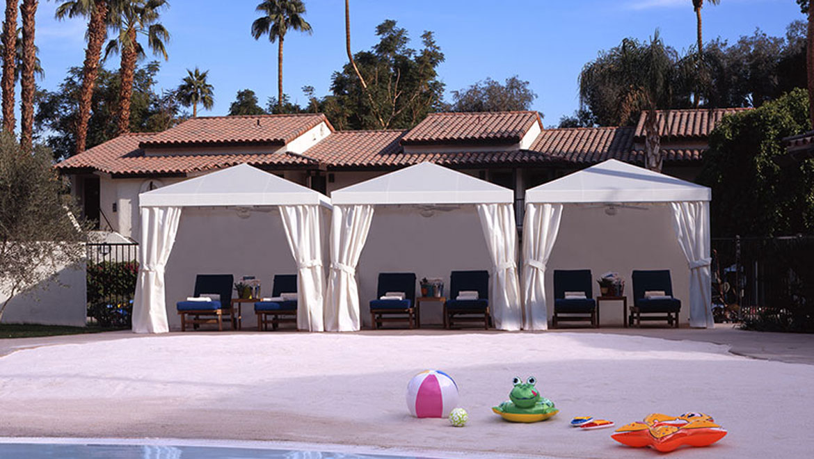 Cabanas by the pool at Omni Rancho Resort 