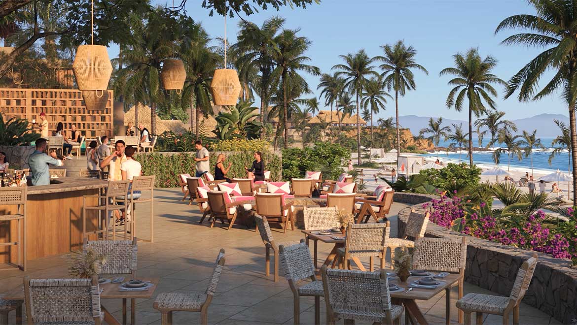 guests dining by the beach