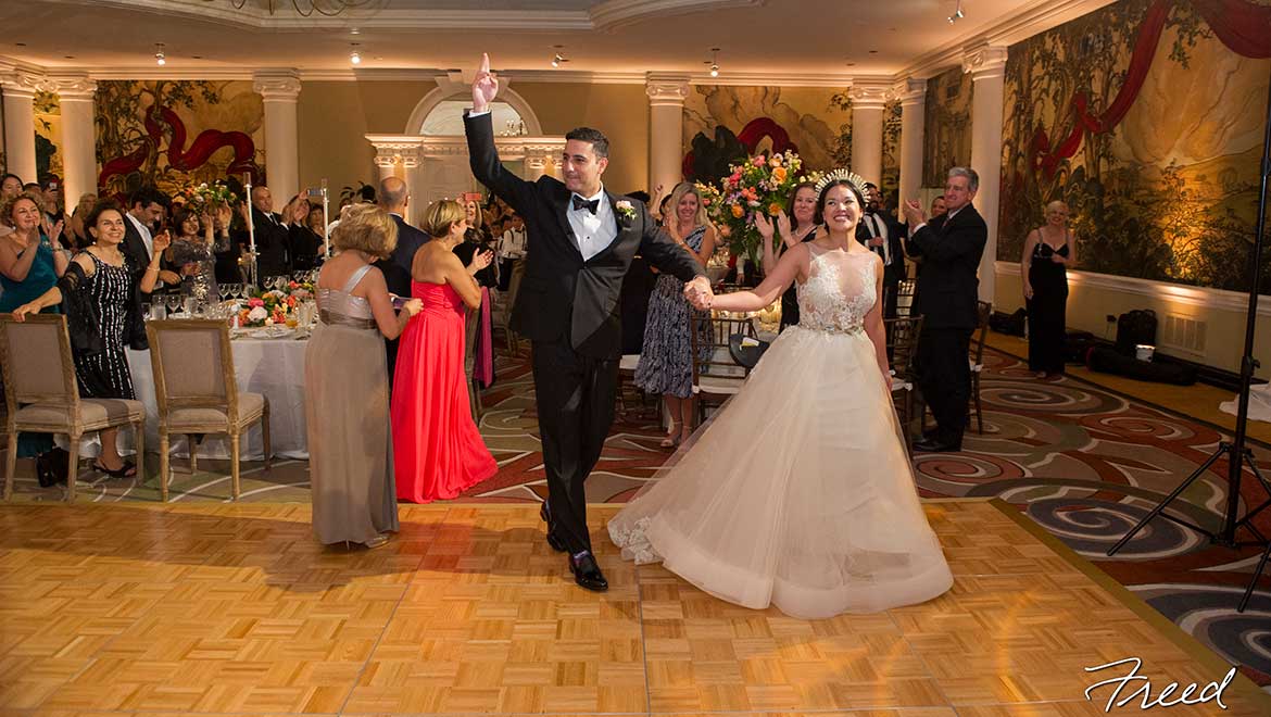 Bride and groom enter dance floor