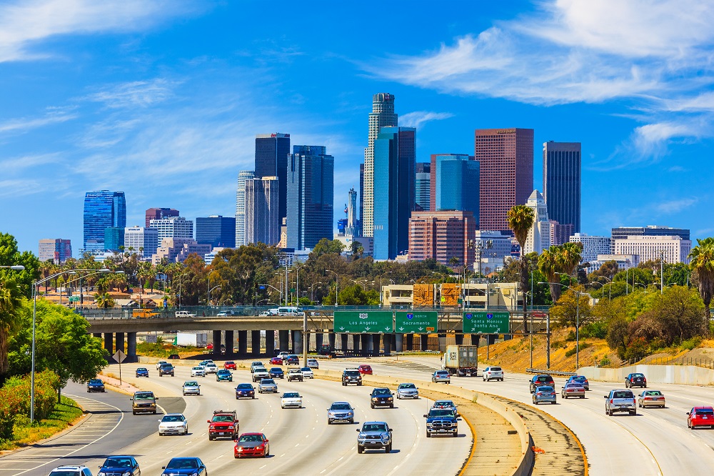 Traffic on freeway leading back to Los Angeles skyline