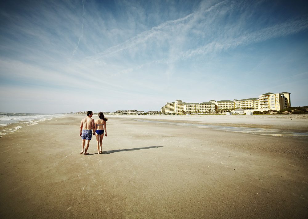 Couple walking on Amelia Island Beach