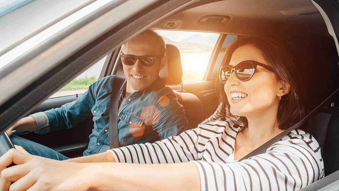 Couple riding in a car. 